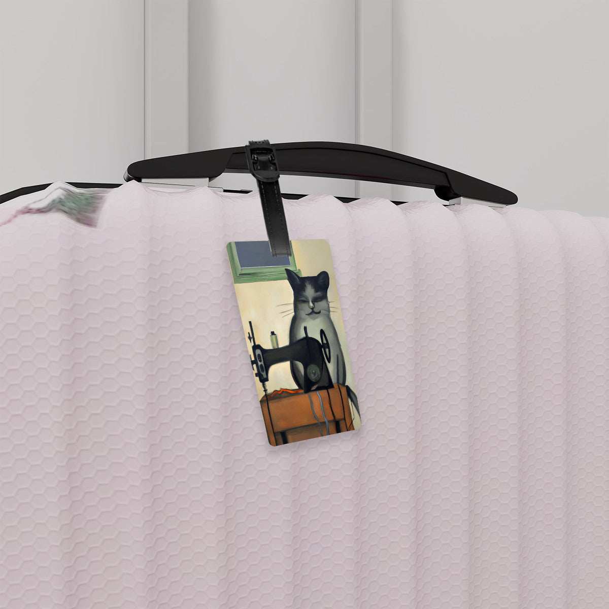 Luggage Tag with "Sewing Cat" design, the ideal gift for people who love to sew, cat lovers, and travelers.