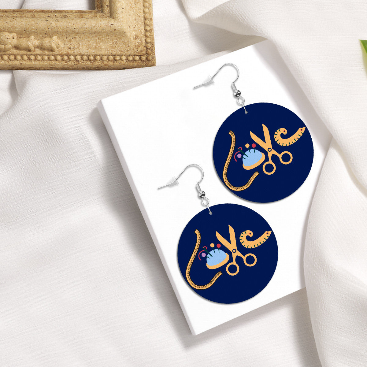 Navy Circle Drop Leather Earrings with " Love Sewing" design, the perfect gifts for people who love to sew