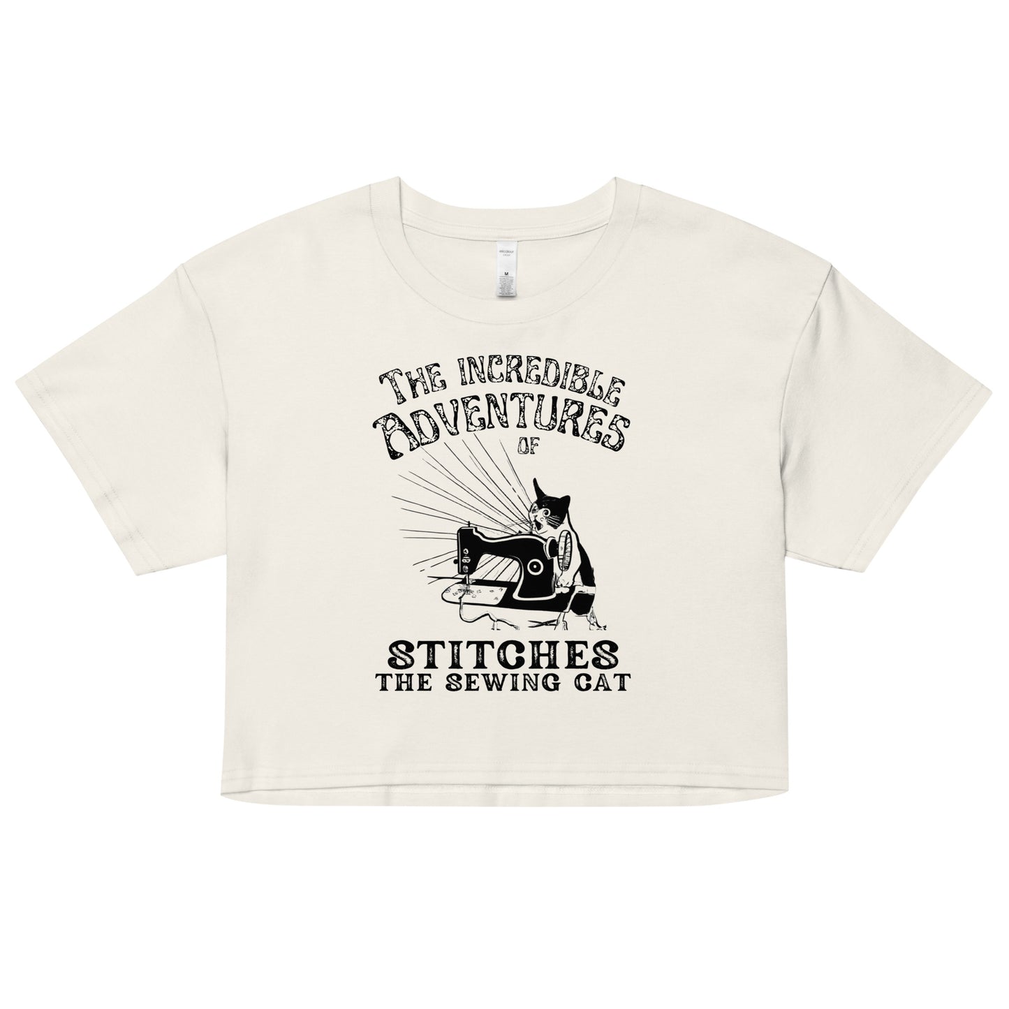 Ecru Crop top with "The Incredible Adventures of Stitches the Sewing Cat – The Perfect Gift for People who Love to Sew