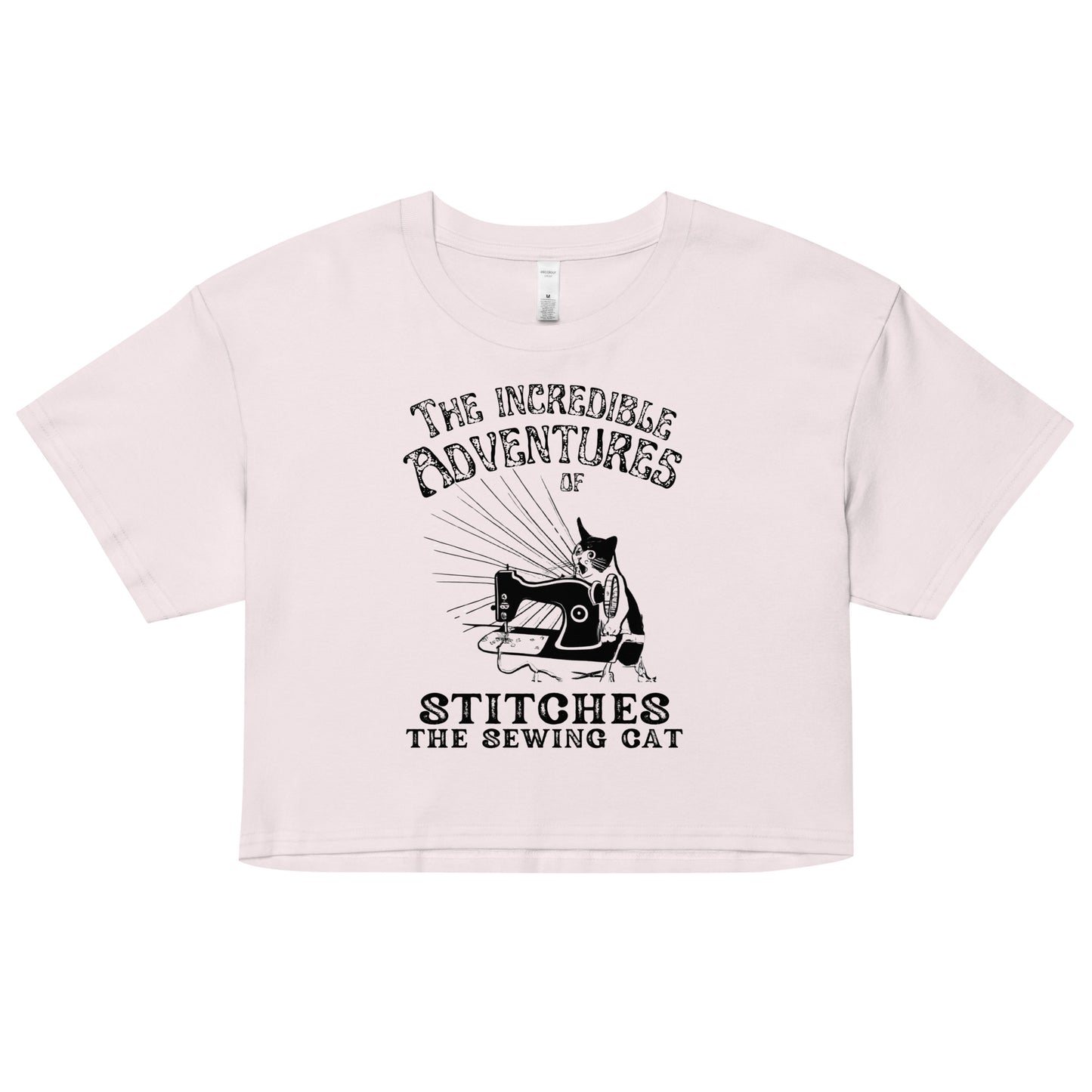 Pale Pink Crop top with "The Incredible Adventures of Stitches the Sewing Cat – The Perfect Gift for People who Love to Sew